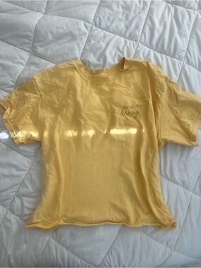 Brandy Melville John Galt Yellow Baby Tee